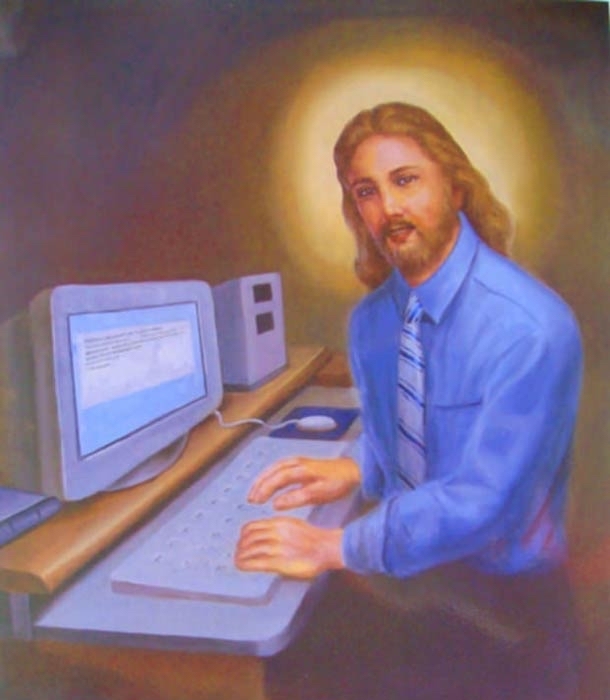 Middle class Jesus, working on his computer